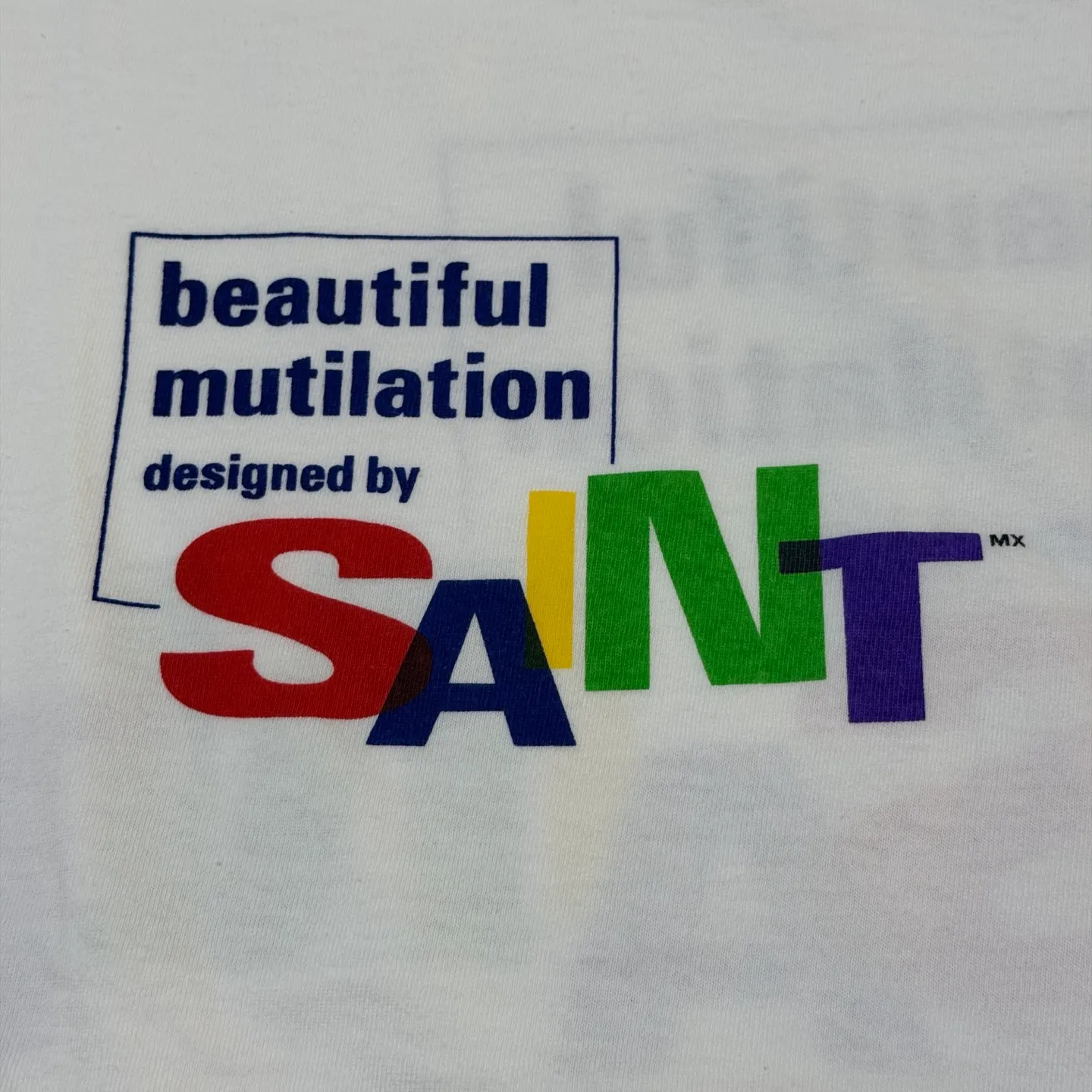 SAINT Mxxxxxx LS TEE/BEAUTIFUL SAINT/WHT Colorful SAINT slogan long-sleeved TEE White S-XL Cylindrical side seamless fabric Really made with care! Domestic printing factory OEM, original water slurry non-touch printing process, correct version, correct main mark/wash mark/little angel anti-counterfeiting mark